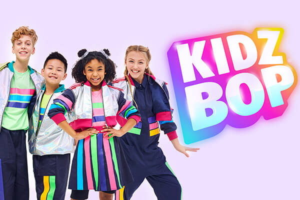 A promotional image for KIDZ BOP Radio featuring four kids wearing colourful clothes.