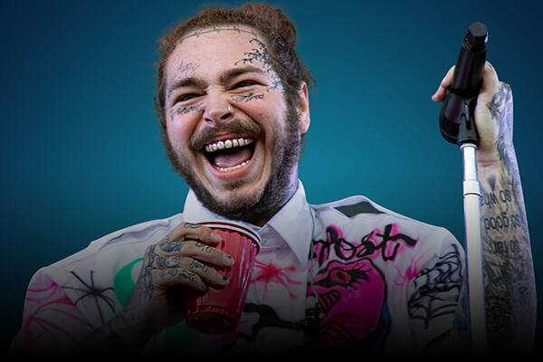 An image of Post Malone laughing.