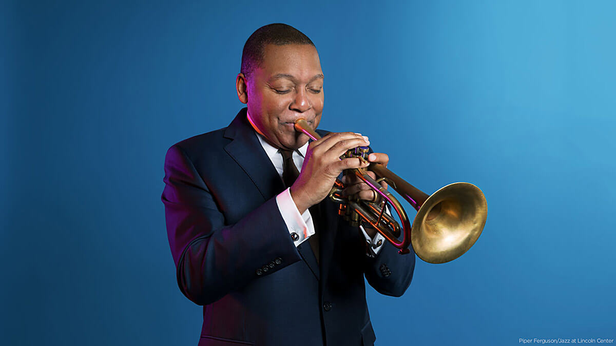 An image of Wynton Marsalis playing a trumpet.