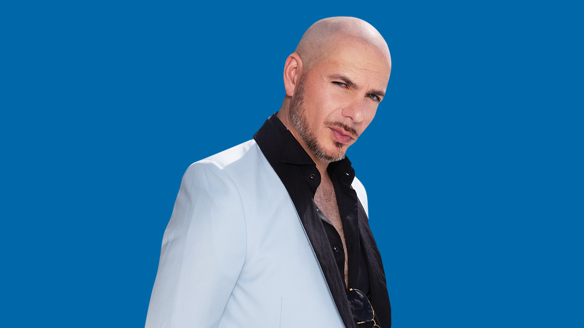 An image of Pitbull looking dapper in a suit.