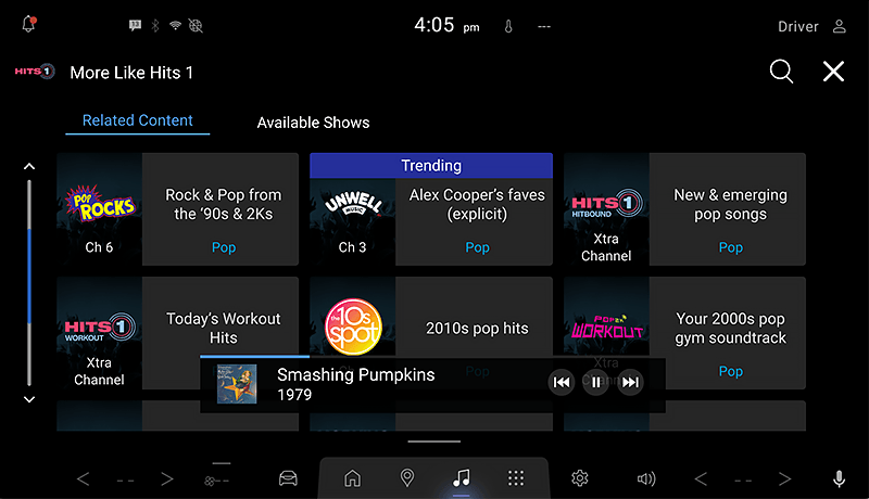L'interface de l'application musicale affiche différentes options d'émissions musicales, notamment "Rock & pop des années 90 et 2000", "Tubes pop des années 2010" et "Tubes d'entraînement", avec un lecteur de musique au bas de l'écran diffusant le morceau 1979 des Smashing Pumpkins.