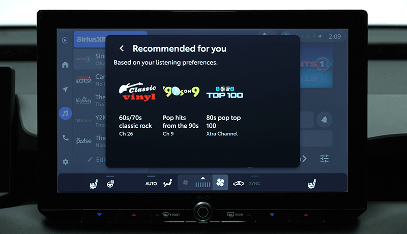 A SiriusXM infotainment screen for Toyota with 360L displays SiriusXM Personalized Recommendations: Classic Vinyl (60s/70s classic rock), 90s on 9 (pop hits from the 90s), and Top 100 (pop top 100), based on listening preferences.