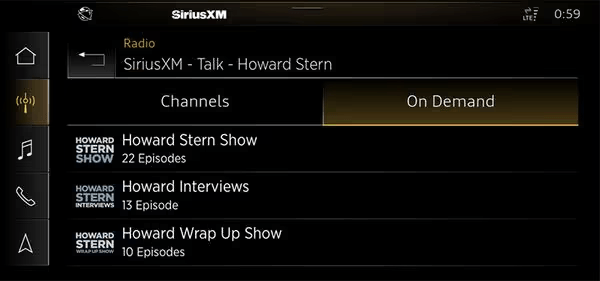 A SiriusXM infotainment screen for Audi with a 360L radio displays SiriusXM’s On Demand options for the Howard Stern Show (22 episodes), Howard Interviews (13 episodes), and Howard Wrap Up Show (10 episodes).