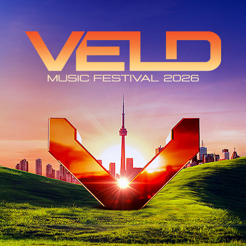 The Veld Toronto Music Festival 2026 logo features a large orange V on green grass, a city skyline with the CN Tower in the background, and a colourful sunrise or sunset sky.