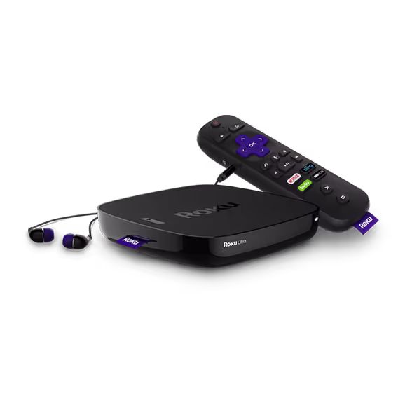 A Roku streaming device with its remote control and a pair of purple and black earbuds are shown against a white background, highlighting seamless compatibility with SiriusXM for an enhanced listening experience.