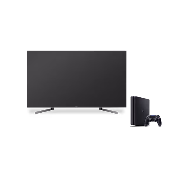 A large Sony flat-screen TV stands on two legs, with a black PlayStation gaming console and a controller placed to the right which offer seamless compatibility with SiriusXM for an enhanced listening experience.
