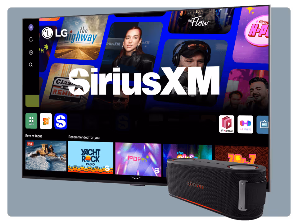 An LG television screen displays the SiriusXM app and music channels, with an LG XBoom Bluetooth speaker placed in front of the TV.
