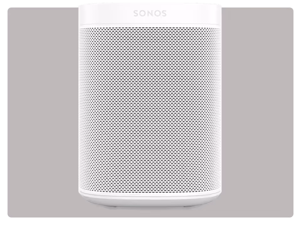 A white Sonos smart speaker with a perforated front grille, displayed against a plain gray background.